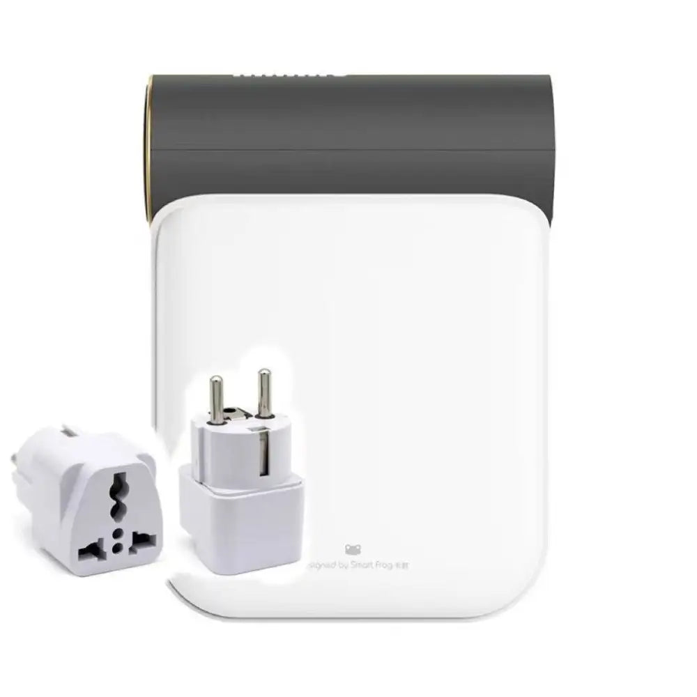 White and gray travel adapter with gold-trimmed top and two detachable plug converters for small quick dryer use