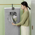 Foldable clothes household small quick dryer with gray fabric, white top panel, and circular control dial