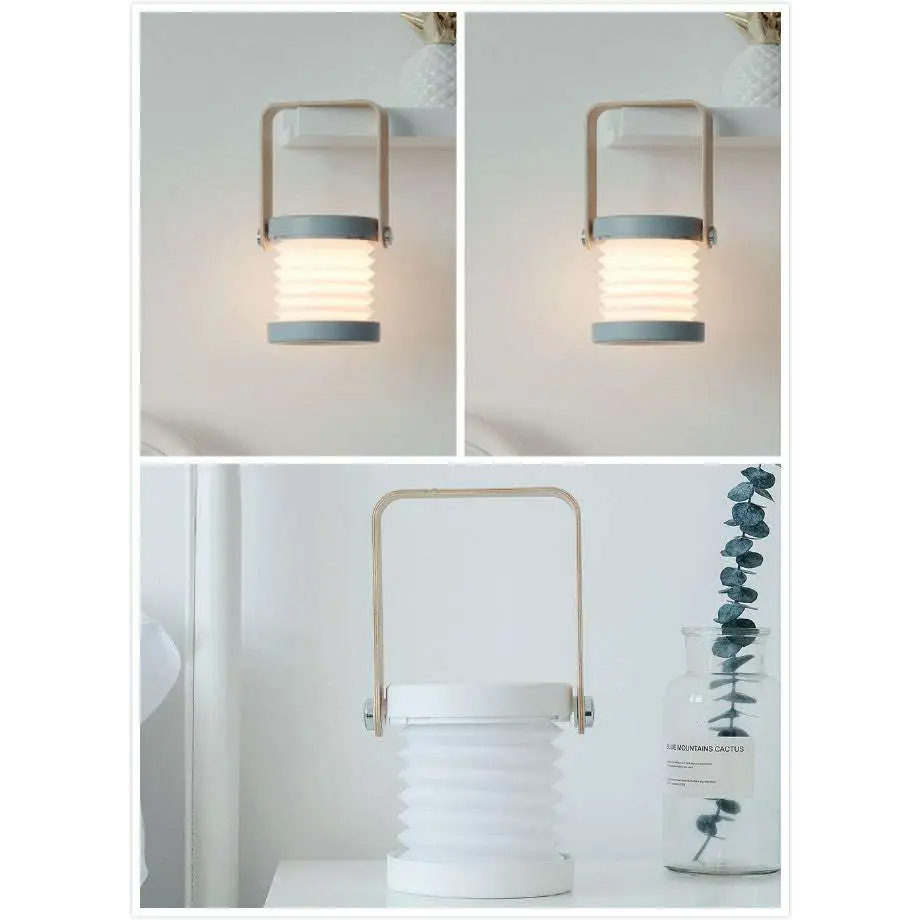 A foldable touch dimmable portable lantern with sleek metallic handle and soft diffused light for reading and outdoor use