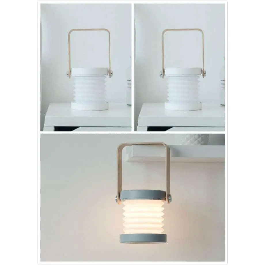 White and gray foldable touch dimmable portable lantern with wooden handle designed for versatile indoor and outdoor lighting