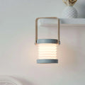 A modern gray foldable touch dimmable portable lantern wall light with soft white glow for reading and night use