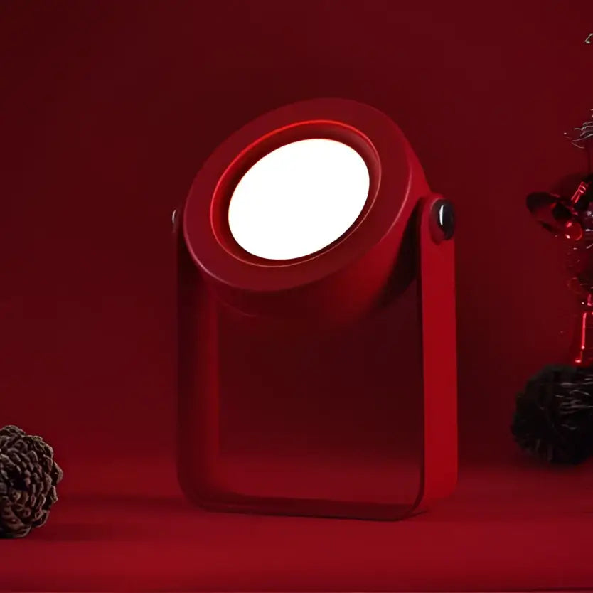 Red foldable touch dimmable portable lantern with circular led spotlight and handle for practical illumination