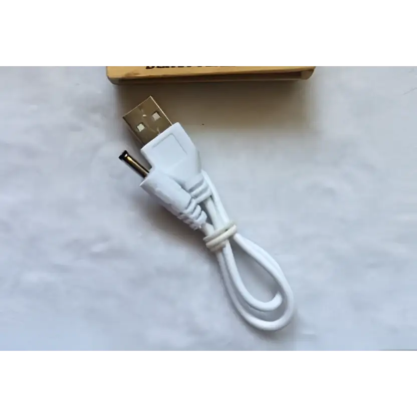 White usb charging cable with coiled design and usb-a connector for foldable touch dimmable portable lantern night light