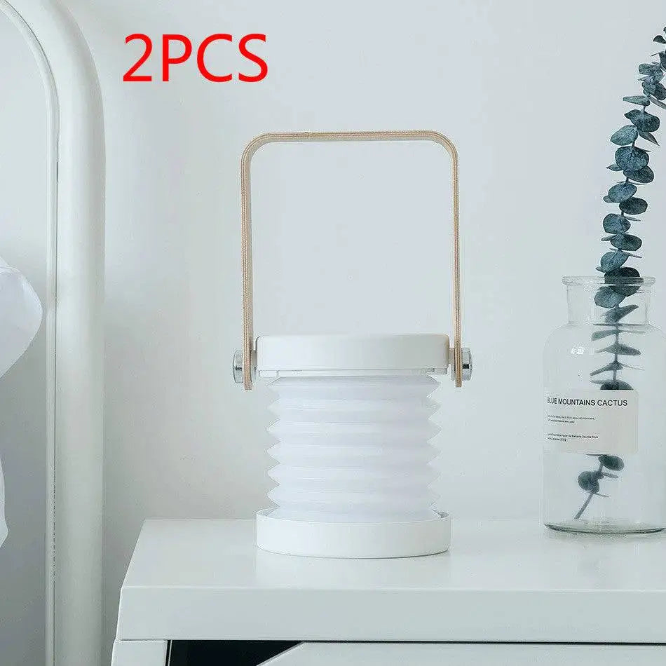 White foldable touch dimmable portable lantern with wooden handle and metallic accents for reading and night light use