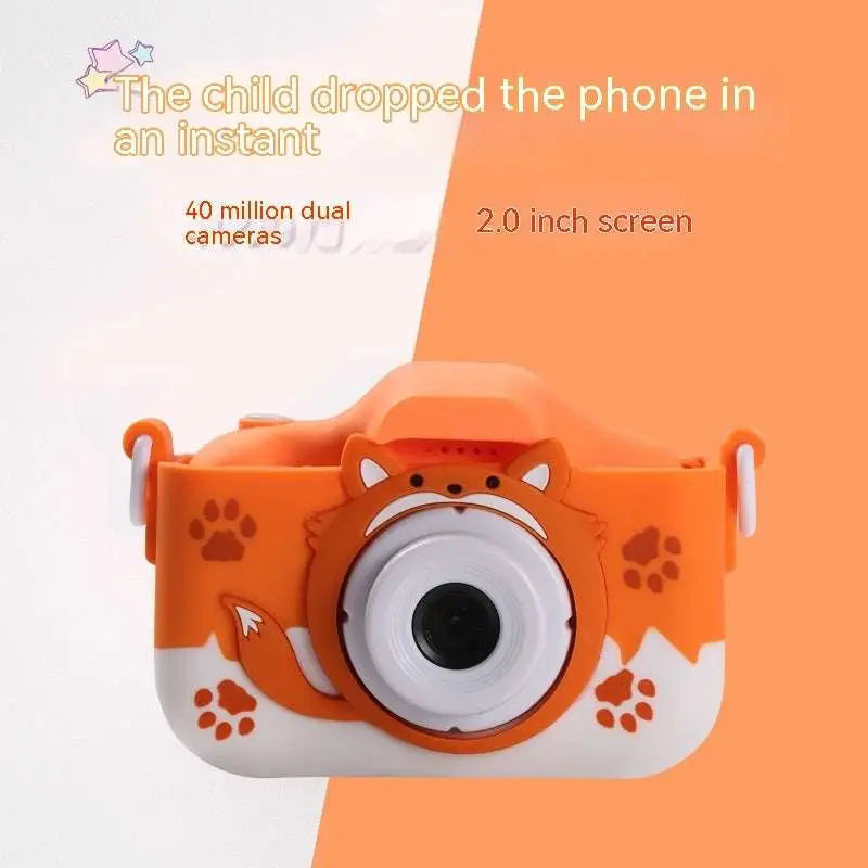 Orange and white fox-themed children’s digital camera with paw print decals and face design for kids photography