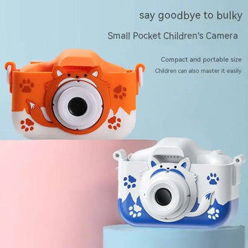 Orange and white fox-themed children’s digital camera with paw print decals and face design paired with blue and white cat model