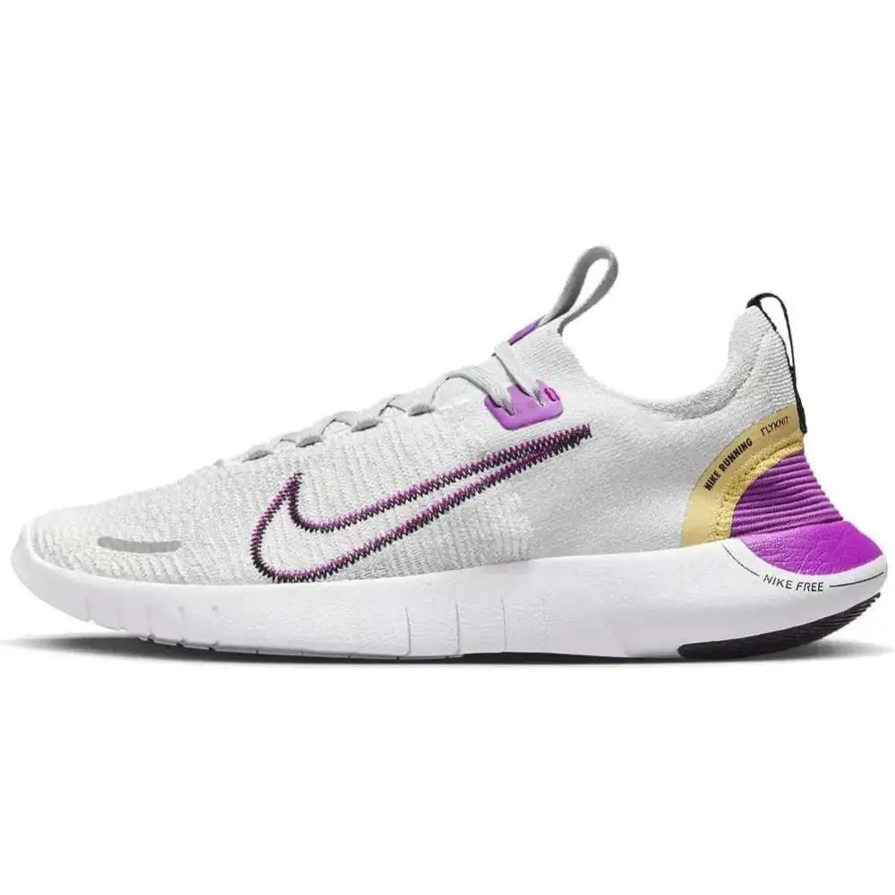 Back view of white nike free 5.0 womens road running shoes with purple and gold knit upper and nike free branding on heel