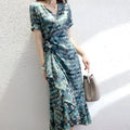 French floral slim polka dot wrap dress in teal and white with short sleeves and ruffled hem for stylish wear
