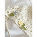 Delicate off-white crocheted french style triangular binder knitted headband with intricate lace and embroidered flowers