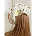 Delicate off-white crocheted french style triangular binder knitted headband with embroidered yellow and blue flowers