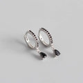Silver hoop earrings in french style wind design featuring black zirconia stones and dangling teardrop black gemstones