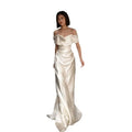 Off-shoulder satin wedding dress in french white with flowing draped fabric and a fitted silhouette for light weddings