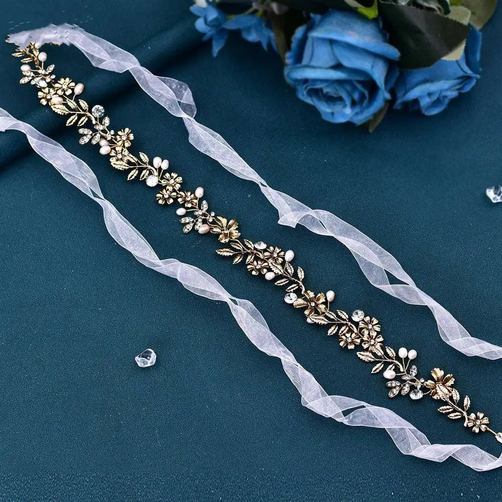 Gold-toned freshwater pearl silver floral headband with leaf design, pearls, crystals, and delicate sheer ribbon tails