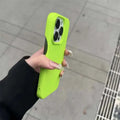 A vibrant lime green frosted finish half-pack graphite case with matte finish designed for iphone with three cameras back view