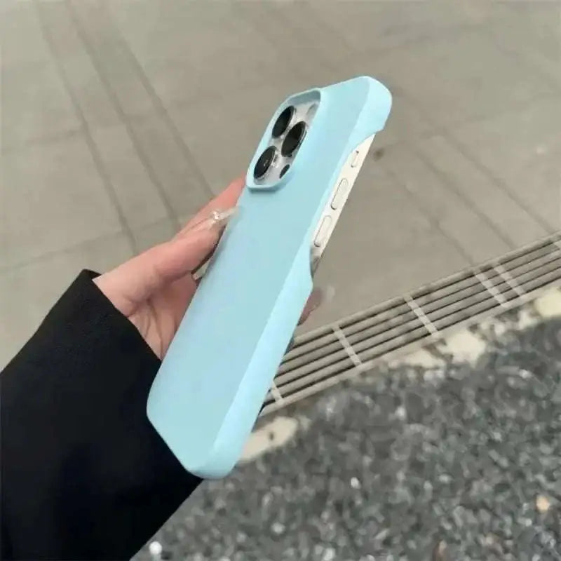 A sleek light blue silicone frosted finish half-pack graphite case with precise cutouts for heat dissipation shown from the back
