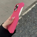 A vibrant pink frosted finish half-pack graphite case made of silicone with a smooth matte back and precise camera cutouts