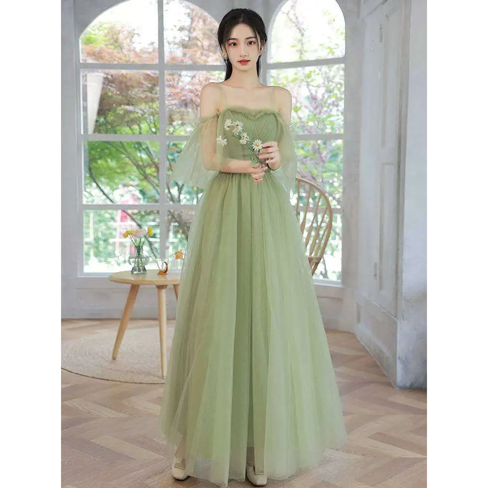 A delicate fruit green fashion personalized long tulle dress with embroidered white flowers and sheer flutter sleeves