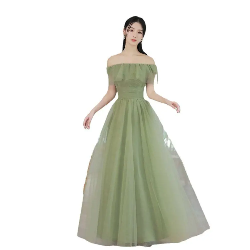 A flowing fruit green fashion personalized long tulle dress with off-the-shoulder fitted bodice and voluminous skirt