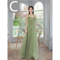 A flowing fruit green fashion personalized long tulle dress with sheer off-the-shoulder sleeves and fitted bodice