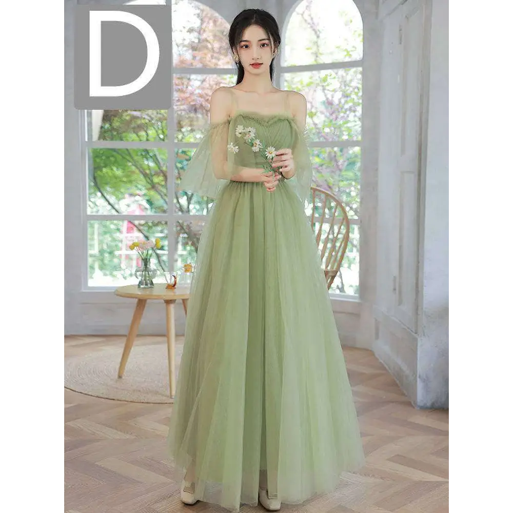 A soft sage green long tulle dress with layered tulle, floral embroidery, and sheer flutter sleeves in fruit green fashion personalized style