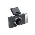 Black and silver future g6 three driving recorder with textured body, circular lens, and screen displaying flip-up display