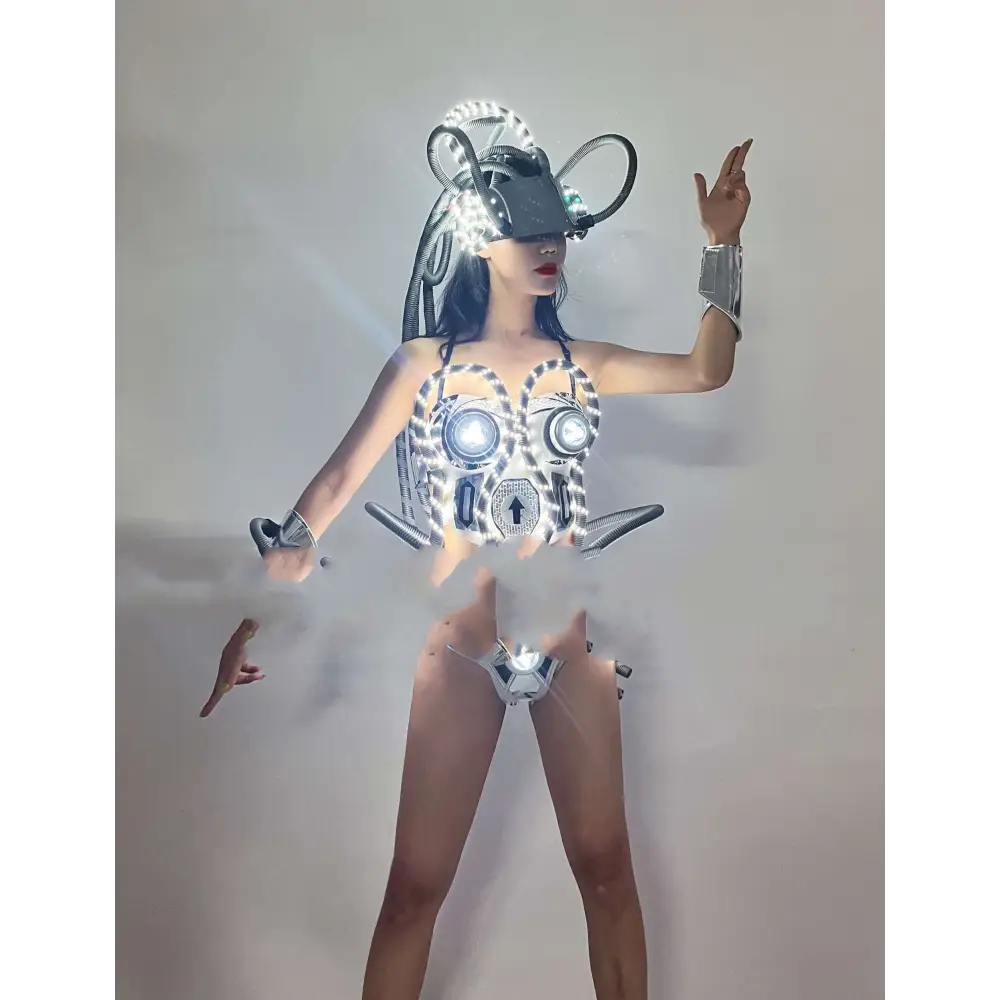 Futuristic shiny silver led luminous chest armor featuring cybernetic bodysuit with glowing circular lights and metallic detailing