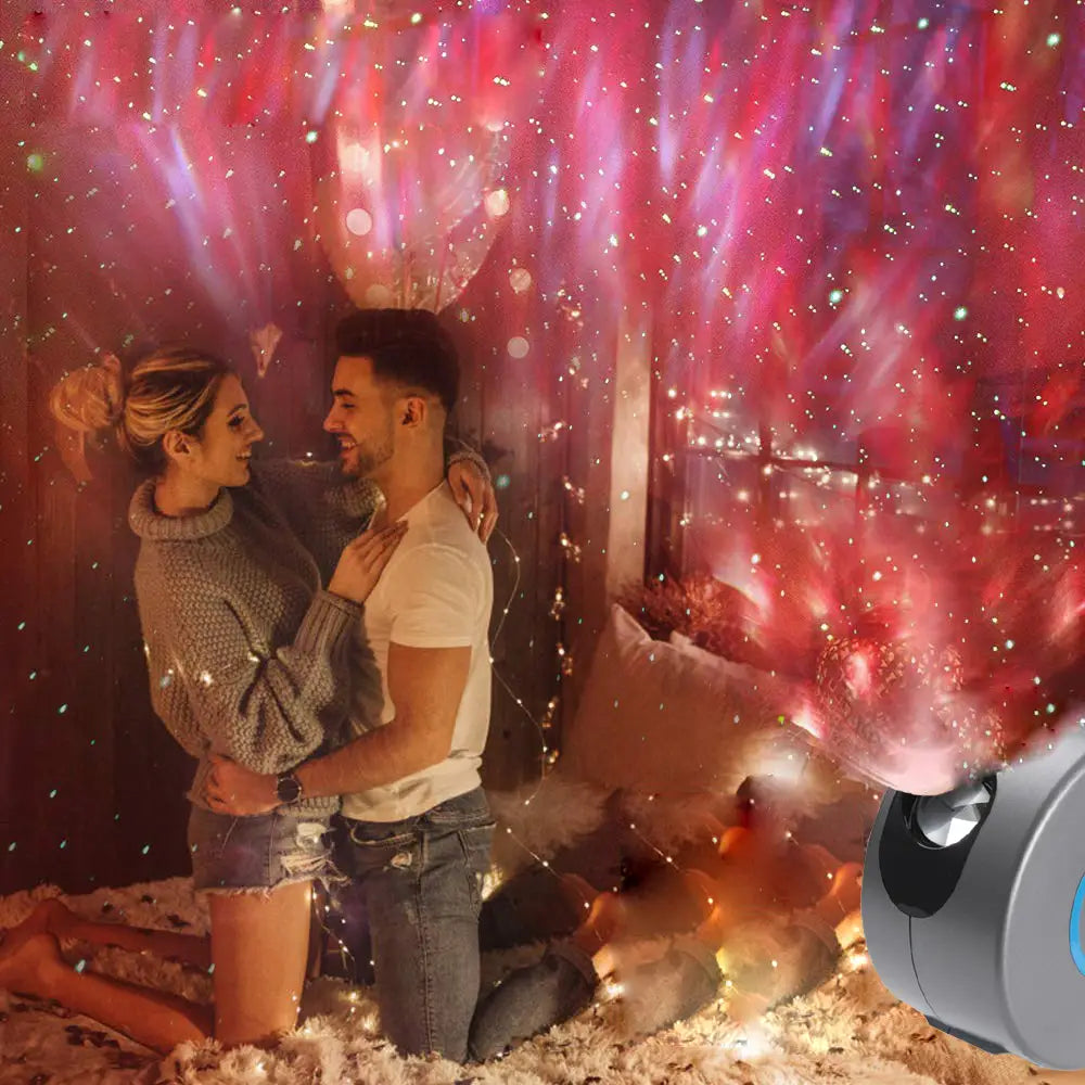 Silver cylindrical galaxy starry sky projector with blue circular accent for rotating galaxy night display