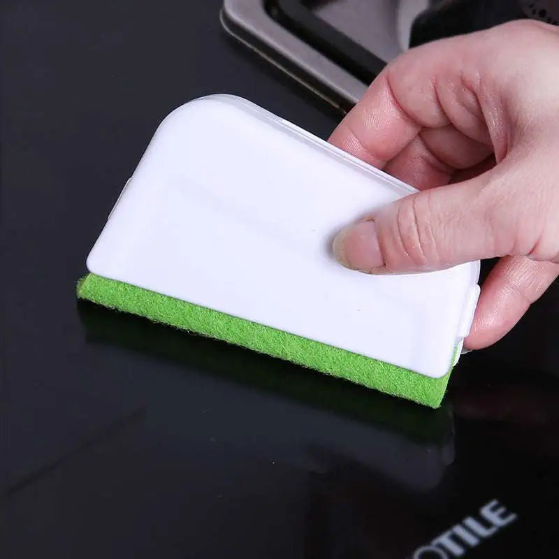 White and green dual-sided gap brush sponge scrubber with smooth plastic top and abrasive bottom for cleaning window grooves