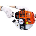 Orange and white osakapro 2.2kw gasoline-powered brush cutter with adjustable handle and plastic pruning tools features black accents and fuel tank cap