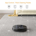 Black circular robot vacuum cleaner geek smart robot with strong suction and visible brush bristles around its base