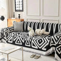 Geometric black and white chenille sofa cover with fringed edges designed for white chenille sofa protection