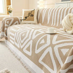 Beige and white geometric-patterned chenille sofa cover with fringed edges for white chenille sofa protection