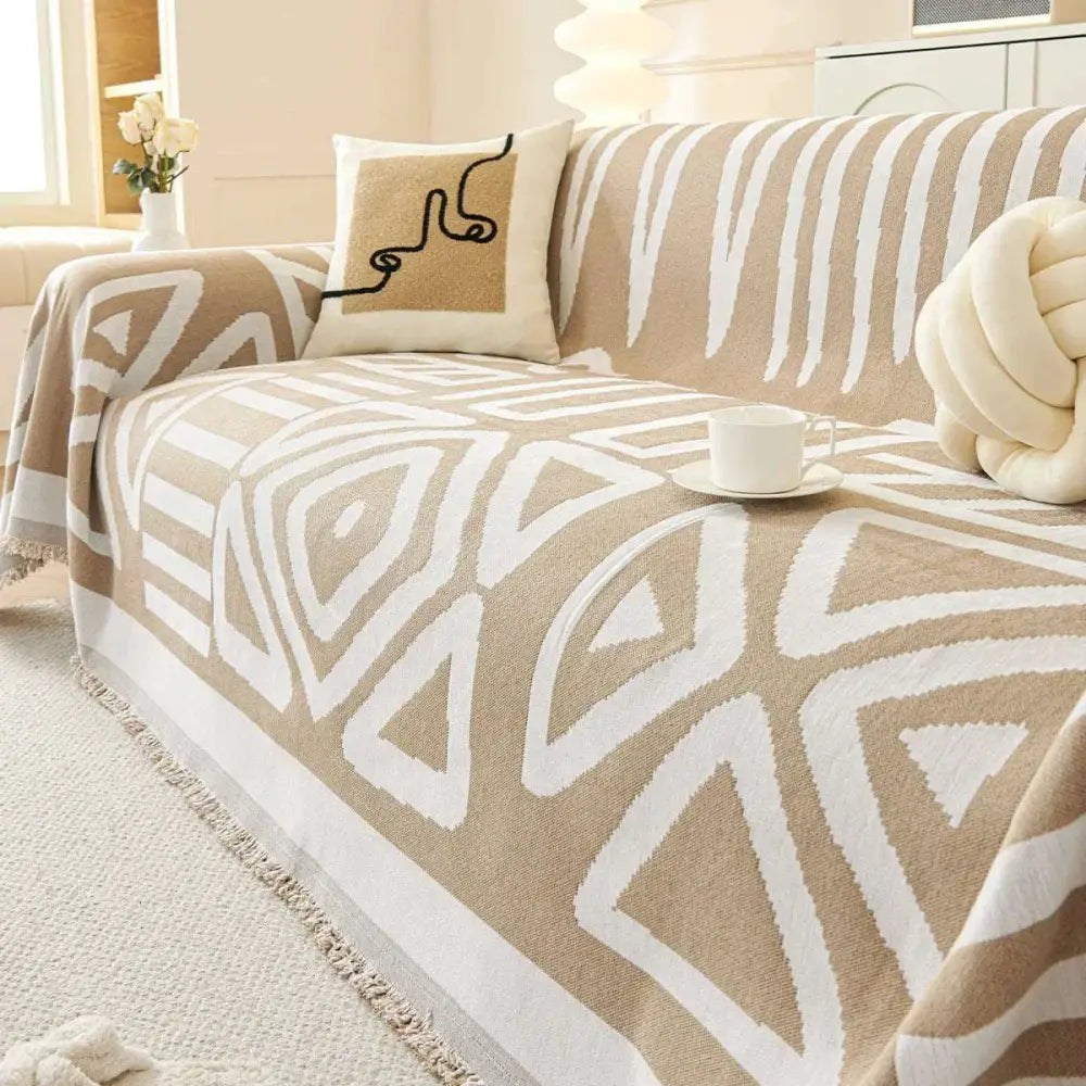 Beige and white geometric-patterned chenille sofa cover with fringed edges for geometric black and white chenille sofa