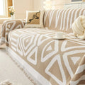 Beige and white geometric-patterned chenille sofa cover with fringed edges for a stylish black and white chenille sofa