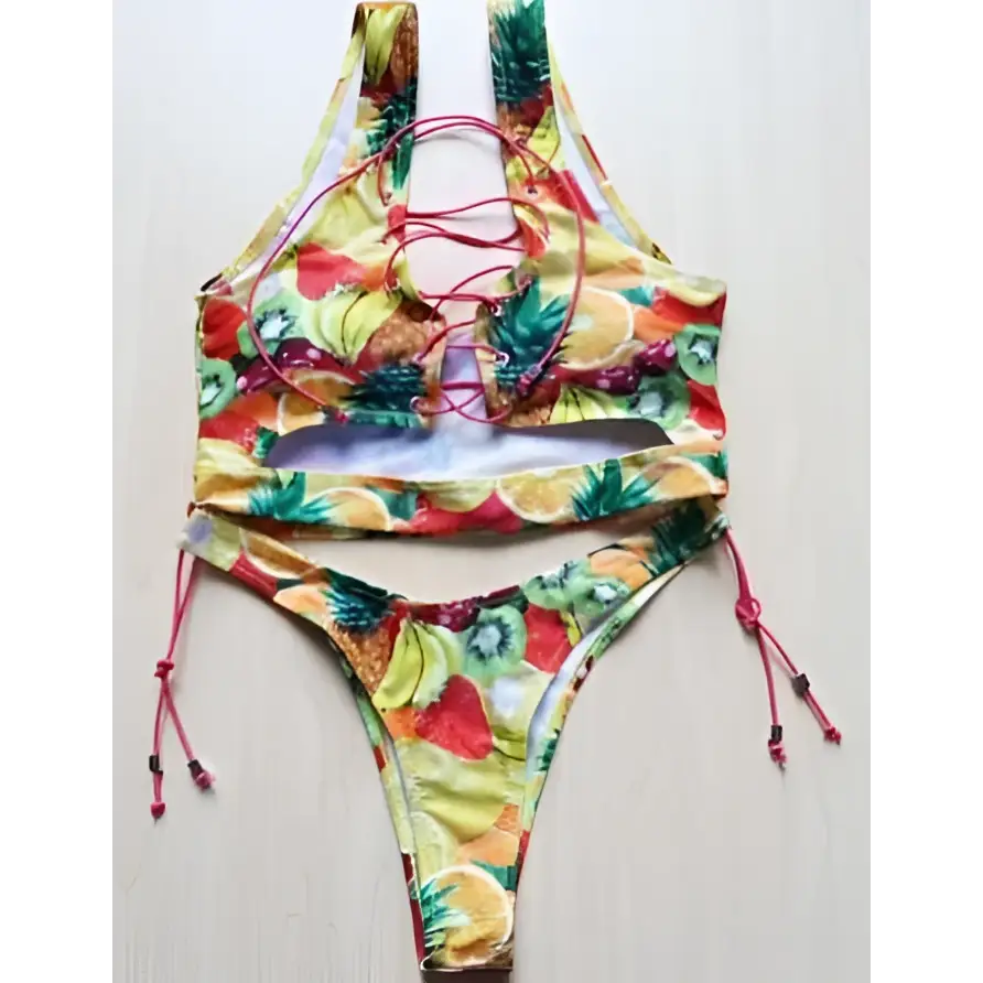 A vibrant tropical fruit-print geometric halter swimwear thong bikini with lace-up front and adjustable ties for big boob women