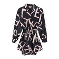 Geometric luxury women’s fashion long sleeve shirt dress in black and blush pink with a cinched waist detail