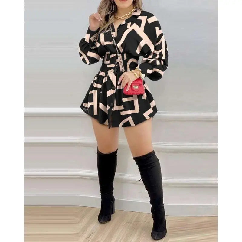 Black and beige geometric luxury women’s fashion long sleeve dress with flared skirt and bold pattern design