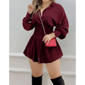 A maroon velvet romper with long sleeves and cinched waist in geometric luxury women’s fashion dress style