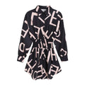 Black and blush pink geometric luxury women’s fashion long sleeve dress with cinched waist detail