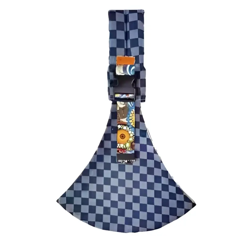 Blue and white checkered fabric axe with colorful patterned strap in geometric patterned black and white baby sling carrier