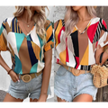 Geometric women’s clothing printed v-neck short-sleeve blouse in vibrant teal orange black and white tones
