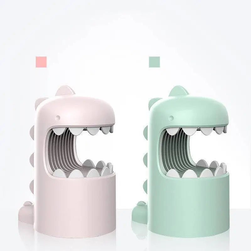 Pastel pink and mint green dinosaur mosquito lamp with smooth plastic bodies and open mouths as mosquito storage box