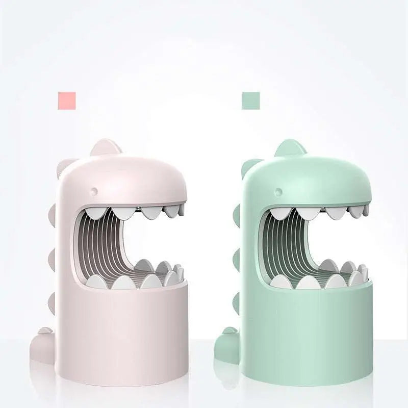 Pastel pink and mint green george dinosaur mosquito lamp with smooth plastic bodies and open mouths as mosquito storage box