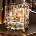 Clear acrylic makeup organizer with gold acrylic cosmetics storage featuring multiple tiers and gold-tone handles and feet