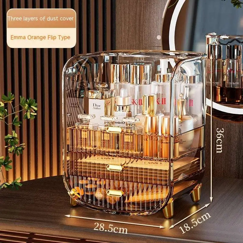 Transparent acrylic makeup organizer with gold-tone accents and flip-top dust cover for acrylic cosmetics storage