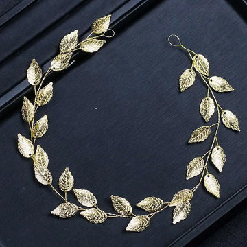 Gold and silver leaf hair band featuring a golden leafy headpiece with intricate filigree and delicate wire branches