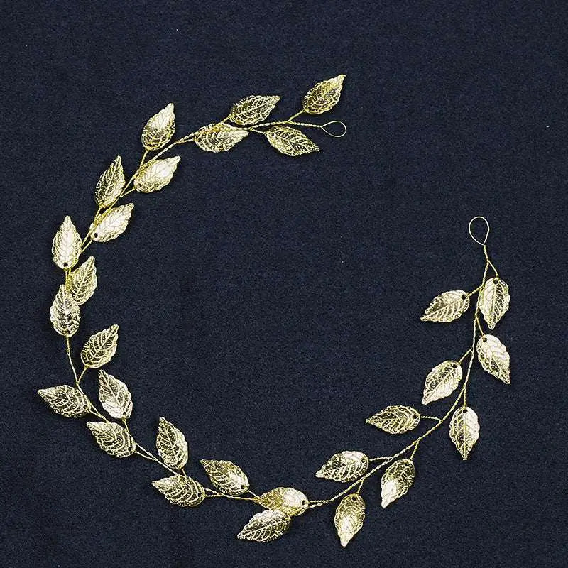 Gold and silver leaf hair band featuring a golden leafy headpiece with intricate wirework for elegant leaf hair styling