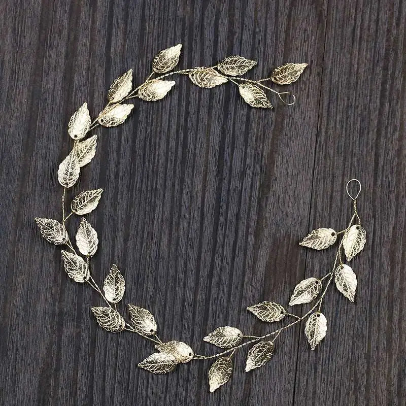 Delicate gold and silver leaf hair band with intricate metallic detailing for elegant leaf hair styling and golden leafy headpiece look