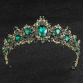 Gold baroque rhinestone crystal bridal crown featuring an ornate gold-toned tiara with emerald teardrop crystals and black accents