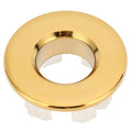Gold bathroom wash basin sink hole overflow cover with polished metallic finish and white plastic mounting flanges